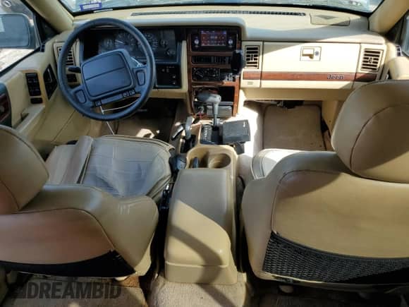 1995 Jeep Grand Cherokee Limited with VIN 1J4GZ78Y4SC788283, listed as a Copart auction lot 47796545 with 283,087 mi miles and Salvage title. Bid and sale history available at DreamBid. Image 8.