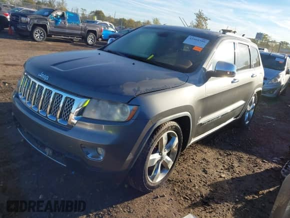 2012 Jeep Grand Cherokee Overland Summit z VIN 1C4RJFCT4CC214957, wystawiony jako IAAI lot #43468380 z przebiegiem 137 539 mil mil oraz . Historia ofert i sprzedaży dostępna na DreamBid. Obrazek 17.