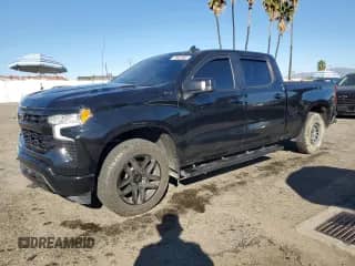 2023 Chevrolet Silverado 1500 RST with VIN 3GCUDEE82PG328415, listed as a Copart auction lot 77622984 with 27,564 mi miles and Salvage title. Bid and sale history available at DreamBid. Image 1.