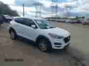 2019 Hyundai Tucson SE with VIN KM8J2CA49KU853120, listed as a IAAI auction lot 43546415 with 98,089 mi miles and . Bid and sale history available at DreamBid. Image 1.