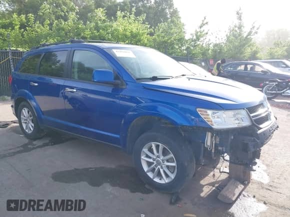 2015 Dodge Journey SXT with VIN 3C4PDDBGXFT574556, listed as a IAAI auction lot 42258095 with 214,267 mi miles and . Bid and sale history available at DreamBid. Image 1.