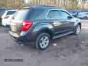 2015 Chevrolet Equinox LT z VIN 2GNFLCE3XF6431622, wystawiony jako IAAI lot #41373771 z przebiegiem 136 210 mil mil oraz . Historia ofert i sprzedaży dostępna na DreamBid. Obrazek 4.