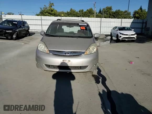 2006 Toyota Sienna XLE z VIN 5TDBA22C46S055629, wystawiony jako Copart lot #67286625 z przebiegiem 294 138 mil mil oraz Szkoda całkowita • Salvage title. Historia ofert i sprzedaży dostępna na DreamBid. Obrazek 14.