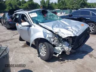 2010 Mercury Mariner Premier with VIN 4M2CN9HG3AKJ27247, listed as a IAAI auction lot 43011250 with 96,157 mi miles and . Bid and sale history available at DreamBid. Image 1.