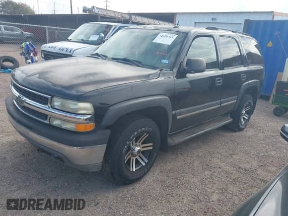 2005 Chevrolet Tahoe LS with VIN 1GNEK13T55J192231, listed as a IAAI auction lot 42620763 with 165,160 mi miles and . Bid and sale history available at DreamBid. Image 2.