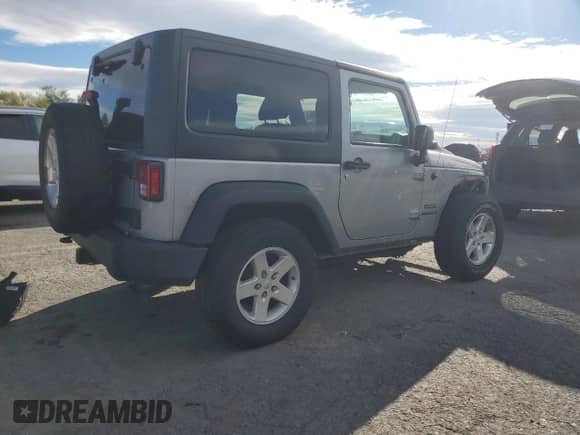 2015 Jeep Wrangler Sport with VIN 1C4AJWAG6FL559608, listed as a Copart auction lot 86658545 with 122,636 mi miles and Salvage title. Bid and sale history available at DreamBid. Image 3.