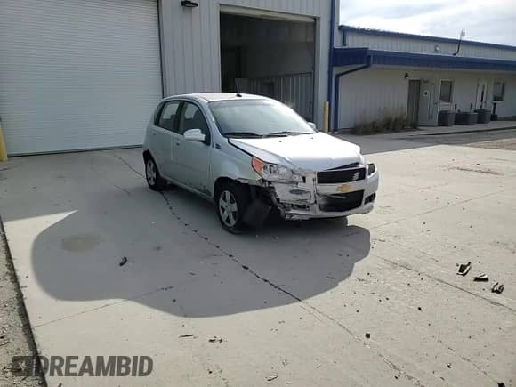 2011 Chevrolet Aveo 1LT z VIN KL1TD6DE3BB205725, wystawiony jako Copart lot #77129904 z przebiegiem 132 792 mil mil oraz Nie do naprawy • Non repairable. Historia ofert i sprzedaży dostępna na DreamBid. Obrazek 11.