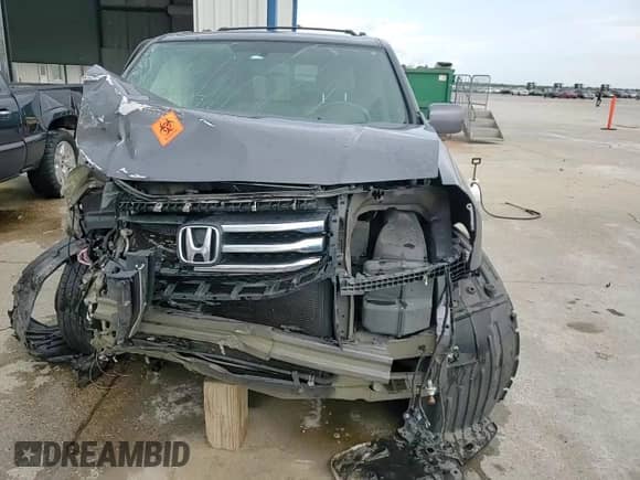 2015 Honda Pilot Touring с VIN 5FNYF3H97FB011917, выставлен на аукционе Copart как лот 54188775 с пробегом Не указан миль и На запчасти • Non repairable. История ставок и продаж доступна на DreamBid. Изображение 14.