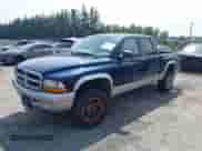 2003 Dodge Dakota SLT with VIN 1D7HG48N53S227334, listed as a IAAI auction lot 42588754 with 182,878 mi miles and . Bid and sale history available at DreamBid. Image 2.