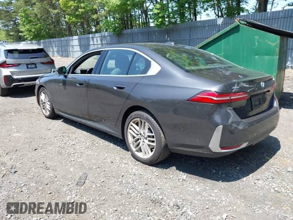 2024 BMW 5 Series 530i xDrive with VIN WBA53FJ00RCS54220, listed as a IAAI auction lot 42403628 with 19,047 mi miles and . Bid and sale history available at DreamBid. Image 3.