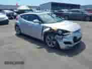 2012 Hyundai Veloster w/Gray Int z VIN KMHTC6AD0CU049684, wystawiony jako IAAI lot #43132772 z przebiegiem 114 146 mil mil oraz . Historia ofert i sprzedaży dostępna na DreamBid. Obrazek 1.