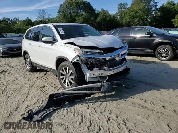 2020 Honda Pilot EX-L z VIN 5FNYF6H51LB014242, wystawiony jako Copart lot #85343125 z przebiegiem 60 912 mil mil oraz Szkoda całkowita • Salvage title. Historia ofert i sprzedaży dostępna na DreamBid. Obrazek 14.