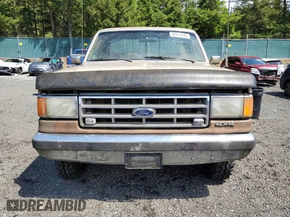 1987 Ford F-150 z VIN 1FTEF14H2HKB06296, wystawiony jako Copart lot #57914035 z przebiegiem 40 931 mil mil oraz Czysty tytuł • Clean title. Historia ofert i sprzedaży dostępna na DreamBid. Obrazek 5.