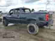 2003 Chevrolet Silverado 2500HD LT with VIN 1GCHK23U03F180119, listed as a Copart auction lot 47255665 with 200,243 mi miles and Salvage title. Bid and sale history available at DreamBid. Image 2.