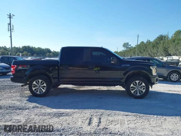 2018 Ford F-150 XLT z VIN 1FTEW1EP8JFC39133, wystawiony jako IAAI lot #43478321 z przebiegiem 132 367 mil mil oraz . Historia ofert i sprzedaży dostępna na DreamBid. Obrazek 13.