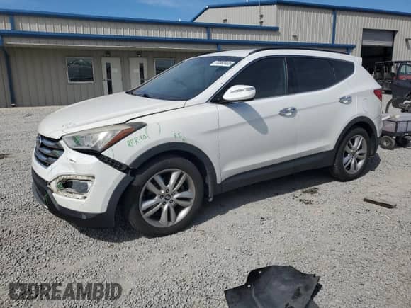 2014 Hyundai Santa Fe with VIN 5XYZUDLA2EG202069, listed as a Copart auction lot 70583405 with 190,694 mi miles and Salvage title. Bid and sale history available at DreamBid. Image 1.