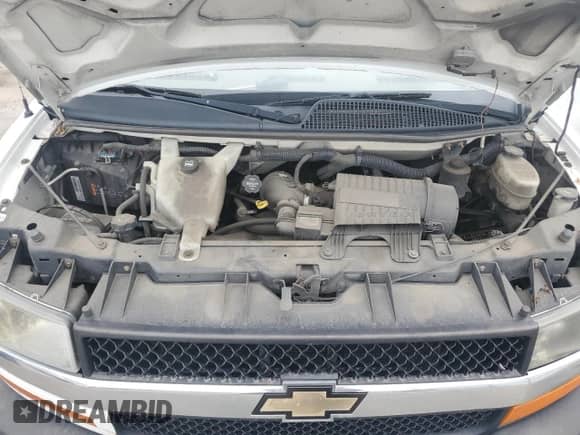 2014 Chevrolet Express Passenger LT с VIN 1GAZG1FG4E1159949, выставлен на аукционе Copart как лот 64321525 с пробегом 295 272 миль миль и Чистый • Clean title. История ставок и продаж доступна на DreamBid. Изображение 12.
