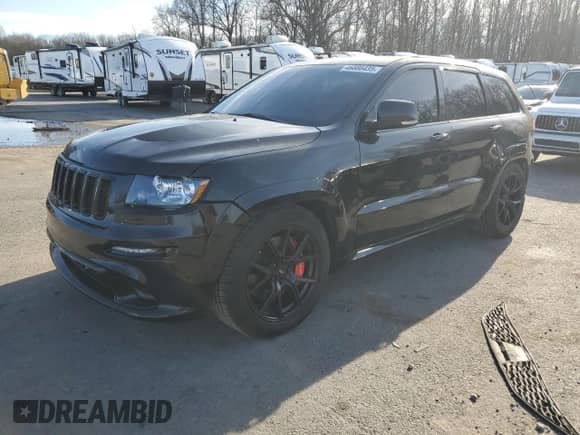 2012 Jeep Grand Cherokee SRT-8 z VIN 1C4RJFDJ3CC152044, wystawiony jako Copart lot #46886435 z przebiegiem 169 619 mil mil oraz Czysty tytuł • Clean title. Historia ofert i sprzedaży dostępna na DreamBid. Obrazek 1.