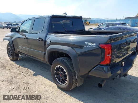 2024 Toyota Tacoma TRD Off Road with VIN 3TMLB5JN7RM069938, listed as a IAAI auction lot 43056789 with 6,837 mi miles and . Bid and sale history available at DreamBid. Image 3.