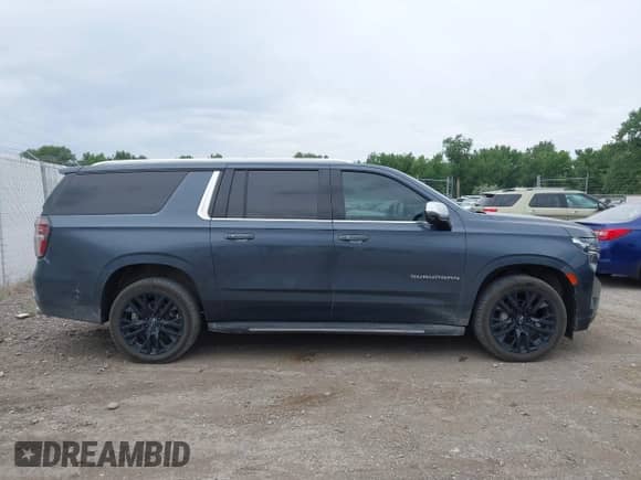 2021 Chevrolet Suburban Premier z VIN 1GNSKFKD5MR245553, wystawiony jako IAAI lot #42646382 z przebiegiem 91 092 mil mil oraz . Historia ofert i sprzedaży dostępna na DreamBid. Obrazek 13.