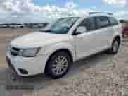2013 Dodge Journey SXT with VIN 3C4PDCBG7DT637071, listed as a Copart auction lot 82041625 with 123,514 mi miles and Salvage title. Bid and sale history available at DreamBid. Image 1.
