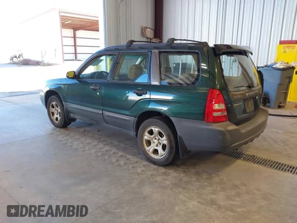 2003 Subaru Forester X with VIN JF1SG63633H720539, listed as a IAAI auction lot 43332862 with 305,928 mi miles and . Bid and sale history available at DreamBid. Image 3.