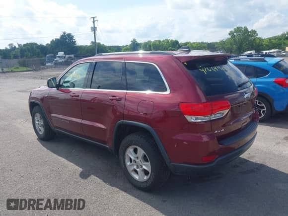 2017 Jeep Grand Cherokee Laredo with VIN 1C4RJFAG3HC958840, listed as a IAAI auction lot 42664925 with 111,896 mi miles and . Bid and sale history available at DreamBid. Image 3.