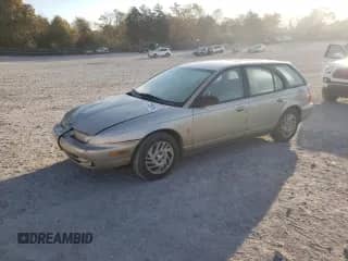 1998 Saturn SW with VIN 1G8ZK8279WZ246084, listed as a Copart auction lot 77267514 with 143,224 mi miles and Clean title. Bid and sale history available at DreamBid. Image 1.