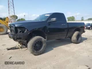 2012 Ram 1500 Express with VIN 3C6JD7AT9CG157060, listed as a Copart auction lot 64777895 with 142,102 mi miles and Salvage title. Bid and sale history available at DreamBid. Image 1.