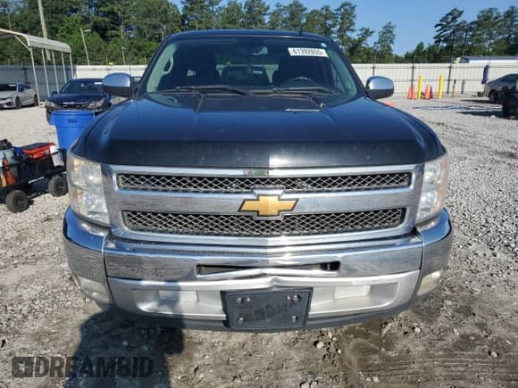 2013 Chevrolet Silverado 1500 LT with VIN 1GCRCSE05DZ290868, listed as a Copart auction lot 61392055 with 141,889 mi miles and Salvage title. Bid and sale history available at DreamBid. Image 5.