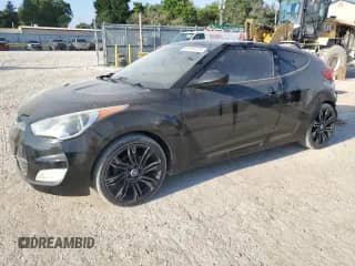 2012 Hyundai Veloster w/Black Int z VIN KMHTC6AD9CU082716, wystawiony jako Copart lot #68193135 z przebiegiem 163 114 mil mil oraz Szkoda całkowita • Salvage title. Historia ofert i sprzedaży dostępna na DreamBid. Obrazek 1.