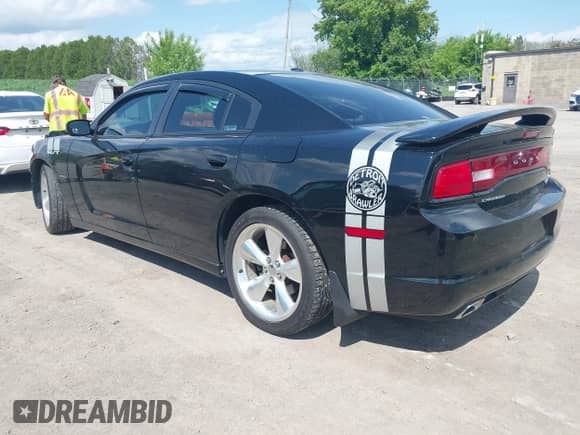 2014 Dodge Charger Road/Track с VIN 2C3CDXCT7EH172582, выставлен на аукционе IAAI как лот 42282534 с пробегом 118 167 миль миль и . История ставок и продаж доступна на DreamBid. Изображение 3.