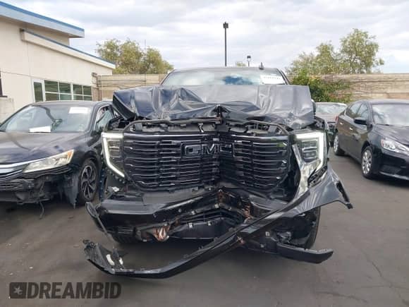 2024 GMC Sierra 1500 Denali Ultimate with VIN 1GTUUHEL6RZ384138, listed as a IAAI auction lot 43111543 with 27,138 mi miles and . Bid and sale history available at DreamBid. Image 13.