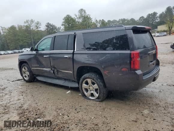 2015 Chevrolet Suburban LT z VIN 1GNSCJKC9FR548894, wystawiony jako Copart lot #81880935 z przebiegiem 161 389 mil mil oraz Szkoda całkowita • Salvage title. Historia ofert i sprzedaży dostępna na DreamBid. Obrazek 2.