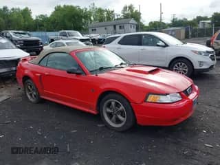 2002 Ford Mustang GT Deluxe z VIN 1FAFP45X82F159132, wystawiony jako IAAI lot #42687664 z przebiegiem 80 828 mil mil oraz . Historia ofert i sprzedaży dostępna na DreamBid. Obrazek 1.