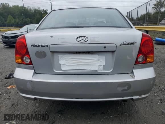 2005 Hyundai Accent GLS z VIN KMHCG45C25U636868, wystawiony jako Copart lot #82320125 z przebiegiem 136 913 mil mil oraz Szkoda całkowita • Salvage title. Historia ofert i sprzedaży dostępna na DreamBid. Obrazek 6.