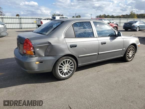2003 Hyundai Accent GL с VIN KMHCG45C23U476391, выставлен на аукционе Copart как лот 78474264 с пробегом 155 731 миль миль и Списание • Salvage title. История ставок и продаж доступна на DreamBid. Изображение 3.