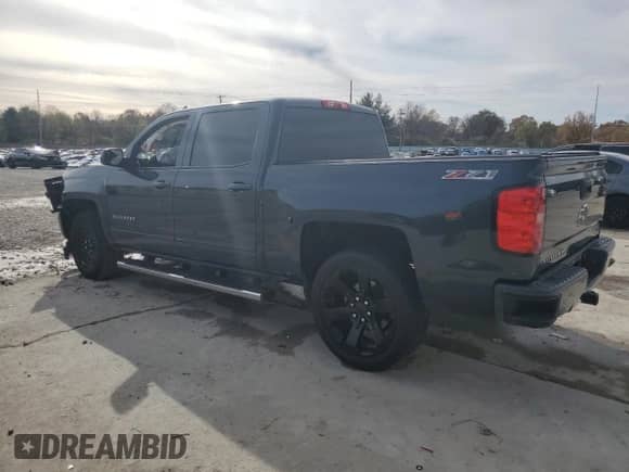 2017 Chevrolet Silverado 1500 LT with VIN 3GCUKRECXHG222975, listed as a Copart auction lot 79806504 with Not provided miles and Salvage title. Bid and sale history available at DreamBid. Image 2.