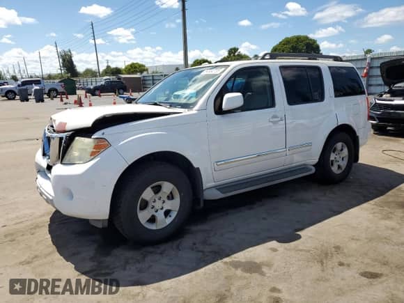 2010 Nissan Pathfinder SE with VIN 5N1AR1NN9AC609586, listed as a Copart auction lot 84584735 with 153,236 mi miles and Salvage title. Bid and sale history available at DreamBid. Image 1.