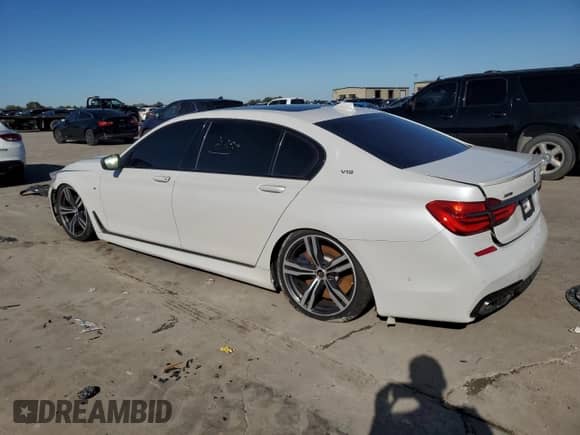 2017 BMW 7 Series with VIN WBA7H6C30HG614434, listed as a Copart auction lot 79236714 with Not provided miles and Clean title. Bid and sale history available at DreamBid. Image 2.
