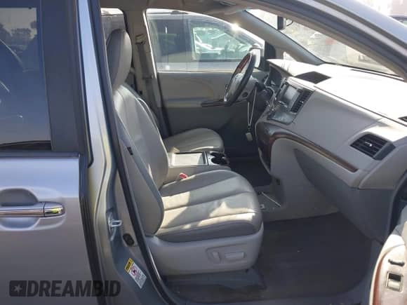 2013 Toyota Sienna XLE AAS with VIN 5TDYK3DC0DS360388, listed as a IAAI auction lot 41163681 with 146,920 mi miles and . Bid and sale history available at DreamBid. Image 5.