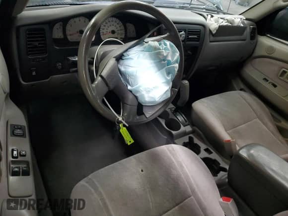 2003 Toyota Tacoma PreRunner with VIN 5TESM92N43Z251344, listed as a Copart auction lot 86184425 with 194,763 mi miles and Salvage title. Bid and sale history available at DreamBid. Image 8.