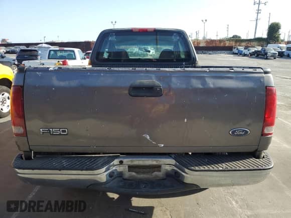 2003 Ford F-150 XL with VIN 1FTRX17223KB15935, listed as a Copart auction lot 70927245 with 167,265 mi miles and Salvage title. Bid and sale history available at DreamBid. Image 6.