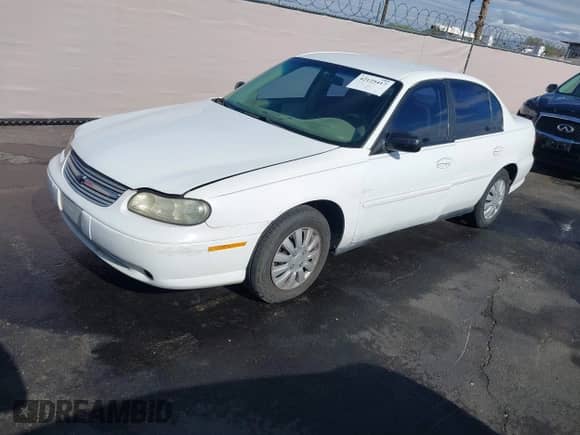 2004 Chevrolet Malibu Classic z VIN 1G1ND52F54M599218, wystawiony jako IAAI lot #42125417 z przebiegiem 66 228 mil mil oraz . Historia ofert i sprzedaży dostępna na DreamBid. Obrazek 2.