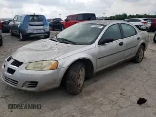 2005 Dodge Stratus SXT with VIN 1B3EL46X95N531900, listed as a Copart auction lot 64093085 with 218,827 mi miles and Salvage title. Bid and sale history available at DreamBid. Image 1.