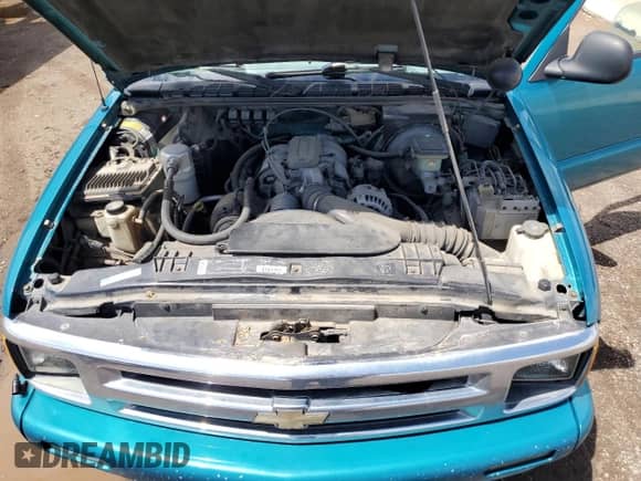 1995 Chevrolet S-10 LS z VIN 1GCCS14W6S8178835, wystawiony jako Copart lot #54881985 z przebiegiem 235 787 mil mil oraz Szkoda całkowita • Salvage title. Historia ofert i sprzedaży dostępna na DreamBid. Obrazek 11.