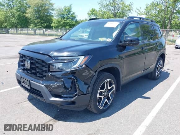 2022 Honda Passport Elite with VIN 5FNYF8H00NB004126, listed as a IAAI auction lot 42401773 with 32,012 mi miles and . Bid and sale history available at DreamBid. Image 2.