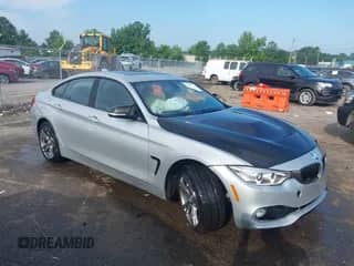 2015 BMW 4 Series 435i xDrive with VIN WBA4B3C53FD670242, listed as a IAAI auction lot 42673258 with 194,840 mi miles and . Bid and sale history available at DreamBid. Image 1.