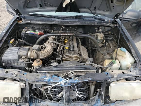 2000 Chevrolet Tracker with VIN 2CNBJ13C8Y6955130, listed as a Copart auction lot 89112385 with 289,680 mi miles and Salvage title. Bid and sale history available at DreamBid. Image 11.