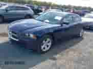2014 Dodge Charger SXT with VIN 2C3CDXHGXEH318582, listed as a IAAI auction lot 43352491 with 165,644 mi miles and . Bid and sale history available at DreamBid. Image 18.